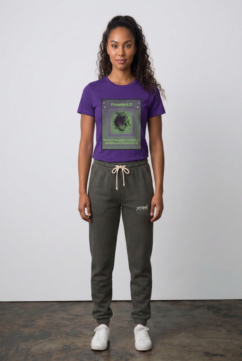 Same female model wearing the purple Guard Your Heart tee with SET APART joggers